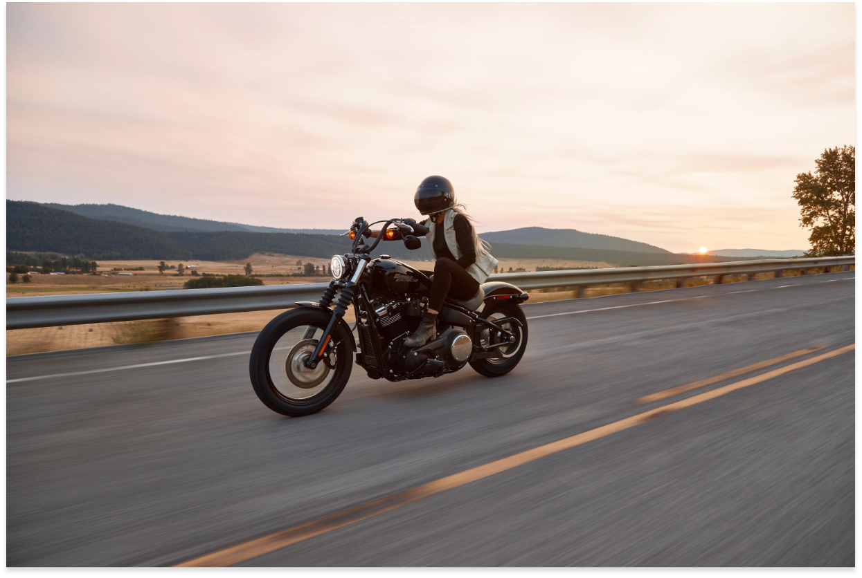 Woman riding a harley davidson